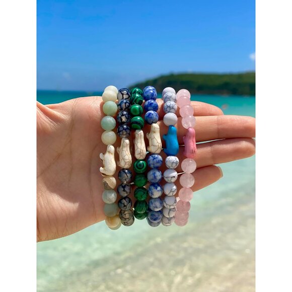 Learn and Support Wildlife with the Polar Bear Tracking Bracelet - Arctic White - Picture 7 of 8